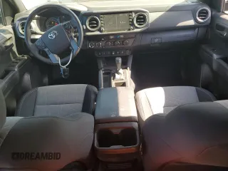 2023 Toyota Tacoma SR with VIN 3TMCZ5AN3PM645372, listed as a Copart auction lot 59917365 with 27,146 mi miles and Salvage title. Bid and sale history available at DreamBid. Image 8.