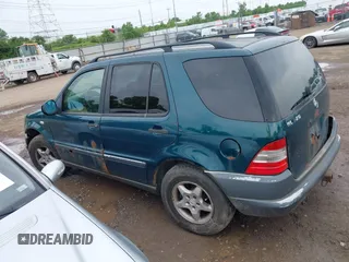 1998 Mercedes-Benz M 320/430/500 with VIN 4JGAB54E4WA046561, listed as a IAAI auction lot 42510300 with 211,689 mi miles and . Bid and sale history available at DreamBid. Image 14.