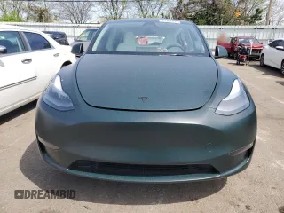 2024 Tesla Model Y z VIN 7SAYGDED4RF206585, wystawiony jako Copart lot #54161715 z przebiegiem 4 228 mil mil oraz Szkoda całkowita • Salvage title. Historia ofert i sprzedaży dostępna na DreamBid. Obrazek 5.