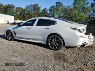 2020 BMW 8 Series M850i with VIN WBAGV8C03LBP49066, listed as a Copart auction lot 48675404 with 28,368 mi miles. Bid and sale history available at carsss.com. Image 2.