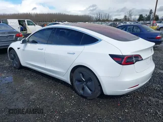 2018 Tesla Model 3 Long Range Battery with VIN 5YJ3E1EA3JF013253, listed as a IAAI auction lot 41752102 with 84,459 mi miles. Bid and sale history available at carsss.com. Image 3.