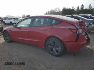 2022 Tesla Model 3 with VIN 5YJ3E1EA8NF167107, listed as a Copart auction lot 48128335 with 218,144 mi miles and Salvage Title. Bid and sale history available at carsss.com. Image 2.