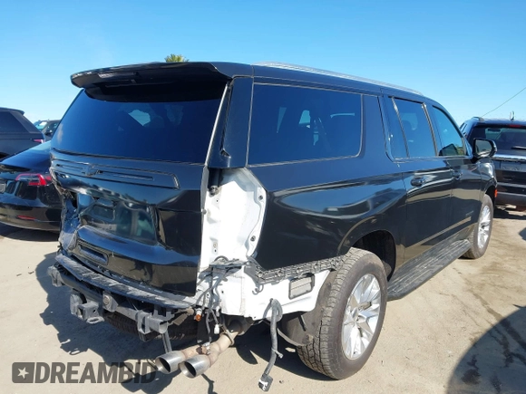 2022 Chevrolet Suburban Premier with VIN 1GNSCFKD9NR159466, listed as a IAAI auction lot 41918002 with 88,005 mi miles and . Bid and sale history available at DreamBid. Image 4.