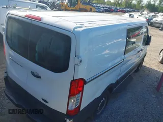 2018 Ford Transit with VIN 1FTYE1YM8JKB52082, listed as a IAAI auction lot 42098033 with 243,181 mi miles. Bid and sale history available at carsss.com. Image 4.