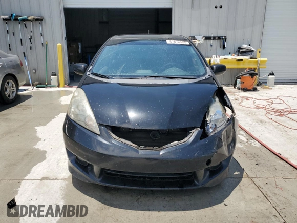 2011 Honda Fit Sport z VIN JHMGE8H51BC015640, wystawiony jako Copart lot #57870555 z przebiegiem 179 497 mil mil oraz Szkoda całkowita • Salvage title. Historia ofert i sprzedaży dostępna na DreamBid. Obrazek 5.