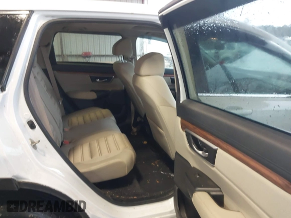 2019 Honda CR-V EX with VIN 2HKRW2H56KH641449, listed as a IAAI auction lot 41762860 with 181,557 mi miles and . Bid and sale history available at DreamBid. Image 8.