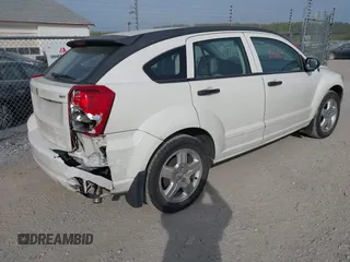 2007 Dodge Caliber SXT with VIN 1B3HB48B57D317870, listed as a IAAI auction lot 42123469 with 170,570 mi miles and . Bid and sale history available at DreamBid. Image 4.
