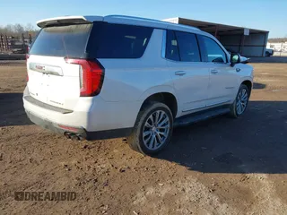 2021 GMC Yukon Denali with VIN 1GKS2DKL2MR458128, listed as a IAAI auction lot 41343876 with 64,732 mi miles. Bid and sale history available at carsss.com. Image 4.