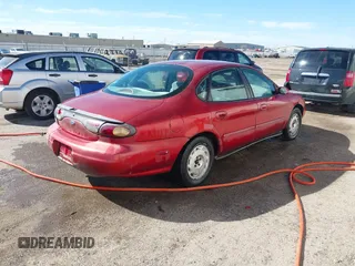 1997 Ford Taurus GL z VIN 1FALP52U2VA207986, wystawiony jako IAAI lot #41606014 z przebiegiem 225 124 mil mil oraz . Historia ofert i sprzedaży dostępna na DreamBid. Obrazek 4.