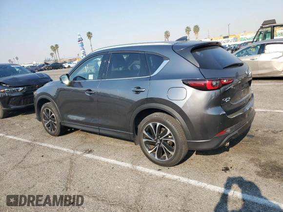 2023 Mazda CX-5 2.5 S Premium Plus Package with VIN JM3KFBEM6P0185977, listed as a Copart auction lot 87872585 with 28,568 mi miles and Salvage Title. Bid and sale history available at carsss.com. Image 2.
