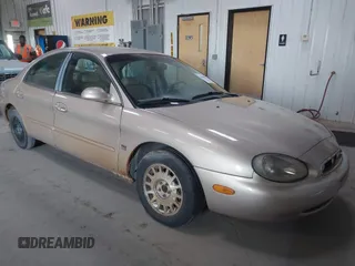 1999 Mercury Sable LS Premium Group z VIN 1MEFM53S2XG611480, wystawiony jako IAAI lot #42194022 z przebiegiem 144 955 mil mil oraz . Historia ofert i sprzedaży dostępna na DreamBid. Obrazek 1.