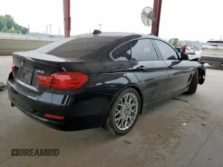 2015 BMW 4 Series 428i z VIN WBA4A5C54FD410835, wystawiony jako Copart lot #57034575 z przebiegiem 135 644 mil mil oraz Czysty tytuł • Clean title. Historia ofert i sprzedaży dostępna na DreamBid. Obrazek 3.