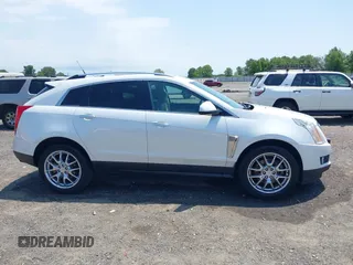 2013 Cadillac SRX Performance Collection z VIN 3GYFNDE35DS578495, wystawiony jako IAAI lot #42323061 z przebiegiem 160 473 mil mil oraz . Historia ofert i sprzedaży dostępna na DreamBid. Obrazek 13.
