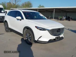 2022 Mazda CX-9 Touring with VIN JM3TCBCY5N0627700, listed as a IAAI auction lot 41974764 with 21,012 mi miles and . Bid and sale history available at DreamBid. Image 1.