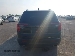 2023 GMC Acadia SLT with VIN 1GKKNMLS8PZ253608, listed as a IAAI auction lot 42264701 with 25,469 mi miles and . Bid and sale history available at DreamBid. Image 17.