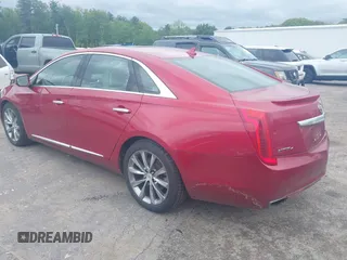 2013 Cadillac XTS Luxury z VIN 2G61R5S38D9229278, wystawiony jako IAAI lot #42321672 z przebiegiem 89 537 mil mil oraz . Historia ofert i sprzedaży dostępna na DreamBid. Obrazek 3.