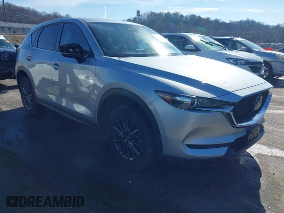 2019 Mazda CX-5 Touring with VIN JM3KFACM8K1602886, listed as a IAAI auction lot 41472201 with 28,431 mi miles. Bid and sale history available at carsss.com. Image 1.