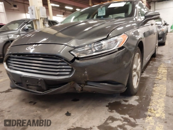 2015 Ford Fusion SE with VIN 1FA6P0H7XF5124074, listed as a IAAI auction lot 41658822 with 127,886 mi miles and . Bid and sale history available at carsss.com. Image 15.