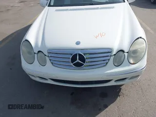 2003 Mercedes-Benz E-Class 3.2L with VIN WDBUF65J63A233107, listed as a IAAI auction lot 42004763 with 151,327 mi miles. Bid and sale history available at carsss.com. Image 6.