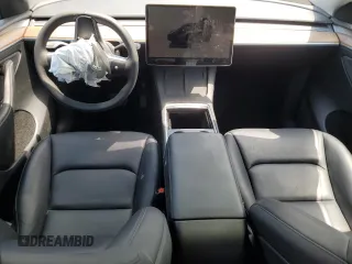 2023 Tesla Model Y Long Range with VIN 7SAYGDEE9PF885405, listed as a Copart auction lot 52858105 with 23,424 mi miles and Non Repairable. Bid and sale history available at DreamBid. Image 8.