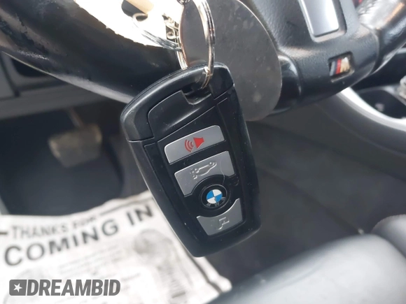 2015 BMW 5 Series 550i with VIN WBAKN9C52FD961297, listed as a IAAI auction lot 40863859 with 76,102 mi miles and . Bid and sale history available at DreamBid. Image 11.