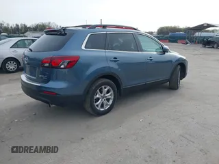 2015 Mazda CX-9 Touring with VIN JM3TB3CVXF0460959, listed as a IAAI auction lot 41940912 with 166,674 mi miles and . Bid and sale history available at DreamBid. Image 4.