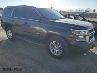 2015 Chevrolet Tahoe LT with VIN 1GNSCBKC8FR246289, listed as a Copart auction lot 47064375 with 102,331 mi miles and Salvage Title. Bid and sale history available at carsss.com. Image 4.