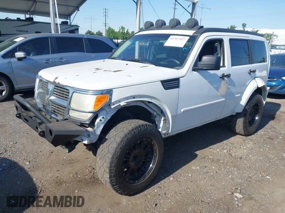 2011 Dodge Nitro Heat with VIN 1D4PT4GK9BW596989, listed as a IAAI auction lot 42397427 with 158,609 mi miles and . Bid and sale history available at DreamBid. Image 17.