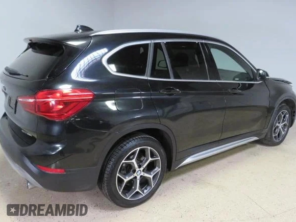 2018 BMW X1 xDrive28i z VIN WBXHT3C35J5L33173, wystawiony jako Copart lot #60927155 z przebiegiem 33 352 mil mil oraz Szkoda całkowita • Salvage title. Historia ofert i sprzedaży dostępna na DreamBid. Obrazek 3.
