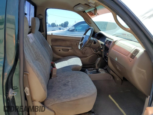 2003 Toyota Tacoma with VIN 5TENL42N73Z234668, listed as a Copart auction lot 55064555 with 164,832 mi miles and Salvage Title. Bid and sale history available at DreamBid. Image 10.