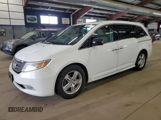 2011 Honda Odyssey Touring Elite with VIN 5FNRL5H90BB083092, listed as a Copart auction lot 54178785 with 135,765 mi miles and Salvage Title. Bid and sale history available at DreamBid. Image 1.