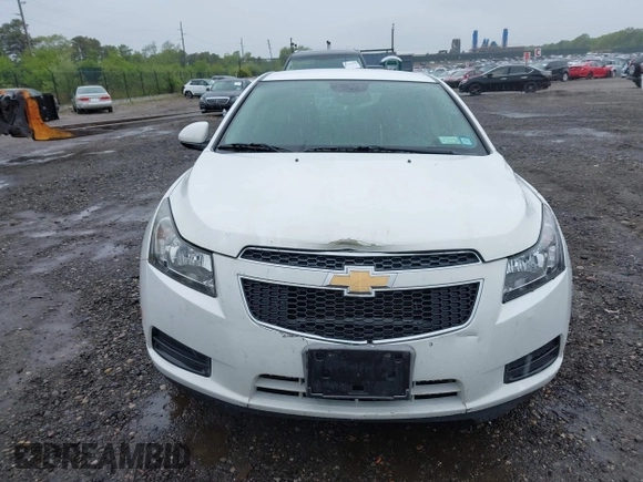2014 Chevrolet Cruze 1LT with VIN 1G1PC5SB6E7233051, listed as a IAAI auction lot 42214334 with 88,389 mi miles and . Bid and sale history available at DreamBid. Image 12.