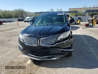 2017 Lincoln MKC Reserve z VIN 5LMTJ3DH4HUL03338, wystawiony jako Copart lot #61224815 z przebiegiem 68 785 mil mil oraz Szkoda całkowita • Salvage title. Historia ofert i sprzedaży dostępna na DreamBid. Obrazek 14.
