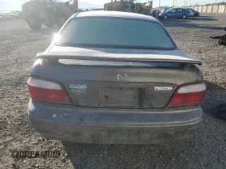 2000 Mazda 626 LX with VIN 1YVGF22D5Y5120152, listed as a Copart auction lot 44571595 with 177,624 mi miles and Salvage Title. Bid and sale history available at carsss.com. Image 6.