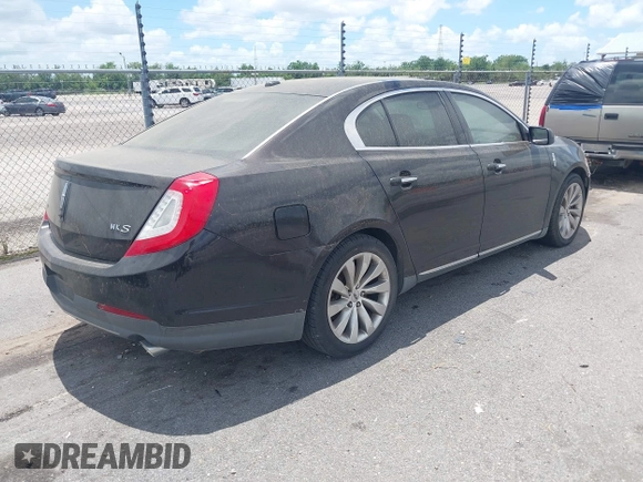 2014 Lincoln MKS with VIN 1LNHL9DK0EG605429, listed as a IAAI auction lot 42809745 with 127,038 mi miles and . Bid and sale history available at DreamBid. Image 4.