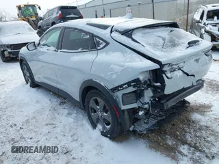 2022 Ford Mustang Mach-E Select z VIN 3FMTK1RM4NMA13627, wystawiony jako IAAI lot #41579778 z przebiegiem 87 108 mil mil oraz . Historia ofert i sprzedaży dostępna na DreamBid. Obrazek 3.
