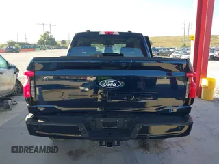 2024 Ford F-150 Lightning z VIN 1FTVW3L72RWG23113, wystawiony jako IAAI lot #41447854 z przebiegiem 1 917 mil mil oraz . Historia ofert i sprzedaży dostępna na DreamBid. Obrazek 16.