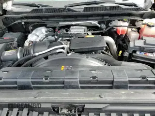 2023 Chevrolet Silverado 2500HD High Country z VIN 1GC4YREY8PF137482, wystawiony jako Copart lot #65201815 z przebiegiem 19 102 mil mil oraz Szkoda całkowita • Salvage title. Historia ofert i sprzedaży dostępna na DreamBid. Obrazek 13.