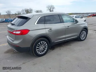 2016 Lincoln MKX Select with VIN 2LMTJ8KR9GBL57397, listed as a IAAI auction lot 42104585 with 286,562 mi miles. Bid and sale history available at carsss.com. Image 4.