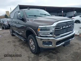 2020 Ram 2500 Laramie z VIN 3C6UR5FL5LG249102, wystawiony jako IAAI lot #41414195 z przebiegiem 42 044 mil mil oraz . Historia ofert i sprzedaży dostępna na DreamBid. Obrazek 1.