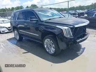 2019 Cadillac Escalade Platinum z VIN 1GYS4DKJ9KR138333, wystawiony jako IAAI lot #42523430 z przebiegiem 104 787 mil mil oraz . Historia ofert i sprzedaży dostępna na DreamBid. Obrazek 1.