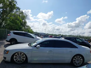 2014 Audi A8 4.0T with VIN WAUR2AFD8EN004371, listed as a IAAI auction lot 42693492 with 159,405 mi miles and . Bid and sale history available at DreamBid. Image 14.