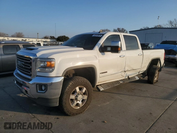 2018 GMC Sierra 2500HD SLT with VIN 1GT12TEYXJF167558, listed as a Copart auction lot 43043825 with 98,363 mi miles and Salvage Title. Bid and sale history available at carsss.com. Image 1.