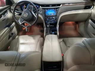 2015 Cadillac XTS Luxury z VIN 2G61M5S39F9189133, wystawiony jako Copart lot #56889185 z przebiegiem 130 927 mil mil oraz Czysty tytuł • Clean title. Historia ofert i sprzedaży dostępna na DreamBid. Obrazek 8.
