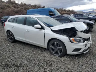 2015 Volvo V60 z VIN YV1902SS6F1228244, wystawiony jako Copart lot #43789925 z przebiegiem 69 835 mil mil oraz Szkoda całkowita • Salvage title. Historia ofert i sprzedaży dostępna na DreamBid. Obrazek 4.