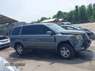 2007 Honda Pilot EX-L z VIN 5FNYF18517B001550, wystawiony jako IAAI lot #42263555 z przebiegiem 246 317 mil mil oraz . Historia ofert i sprzedaży dostępna na DreamBid. Obrazek 13.
