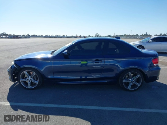 2010 BMW 1 Series 135i with VIN WBAUC7C58AVK96377, listed as a IAAI auction lot 41666512 with 136,890 mi miles and . Bid and sale history available at carsss.com. Image 14.