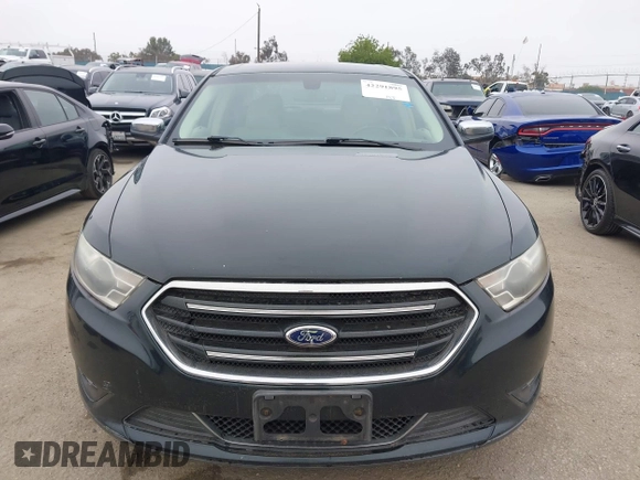 2015 Ford Taurus Limited с VIN 1FAHP2F8XFG108591, выставлен на аукционе IAAI как лот 42291895 с пробегом 215 401 миль миль и . История ставок и продаж доступна на DreamBid. Изображение 12.