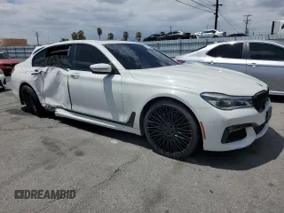 2016 BMW 7 Series 750i z VIN WBA7F0C56GGL99130, wystawiony jako Copart lot #56972905 z przebiegiem 100 556 mil mil oraz Czysty tytuł • Clean title. Historia ofert i sprzedaży dostępna na DreamBid. Obrazek 4.