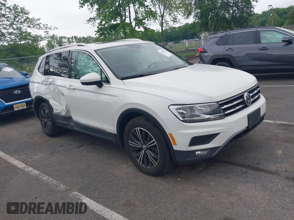 2018 Volkswagen Tiguan SEL with VIN 3VV2B7AX4JM012840, listed as a IAAI auction lot 42263511 with 105,510 mi miles and . Bid and sale history available at DreamBid. Image 1.